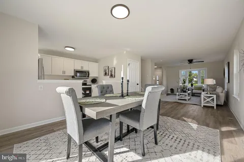 a view of a dining room with furniture