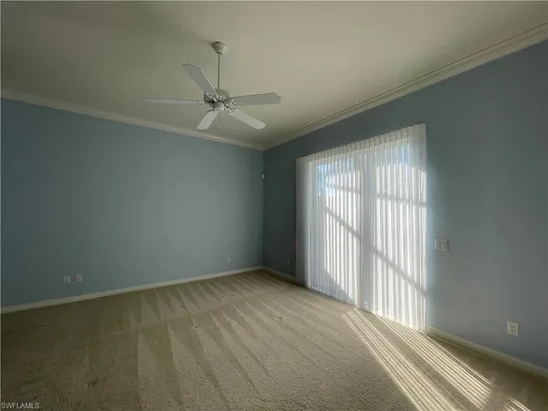 an empty room with a empty space and a window