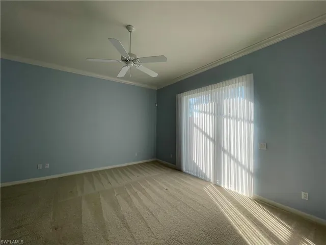 an empty room with a empty space and a window