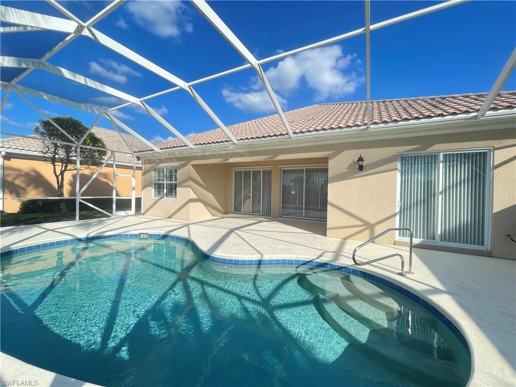 7025 Leopardi Court Naples, FL 34114 - Photo 3 of 48 a view of a house with backyard