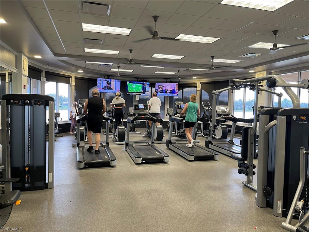 7025 Leopardi Court Naples, FL 34114 - Photo 48 of 48 a view of a room with gym equipment