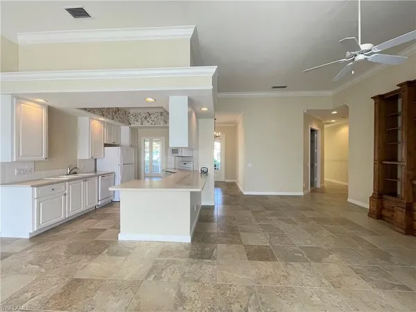 a large bathroom with a large tub shower and sink