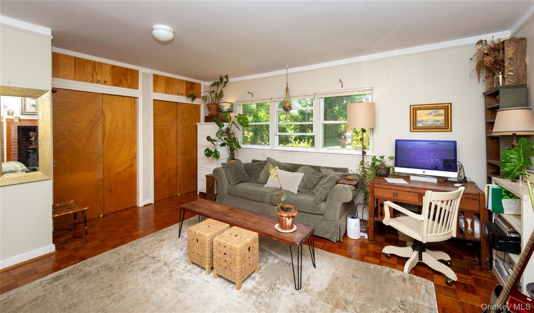 32 Cobb Road Brewster, NY 10509 - Photo 35 of 49 a living room with furniture a flat screen tv and a large window