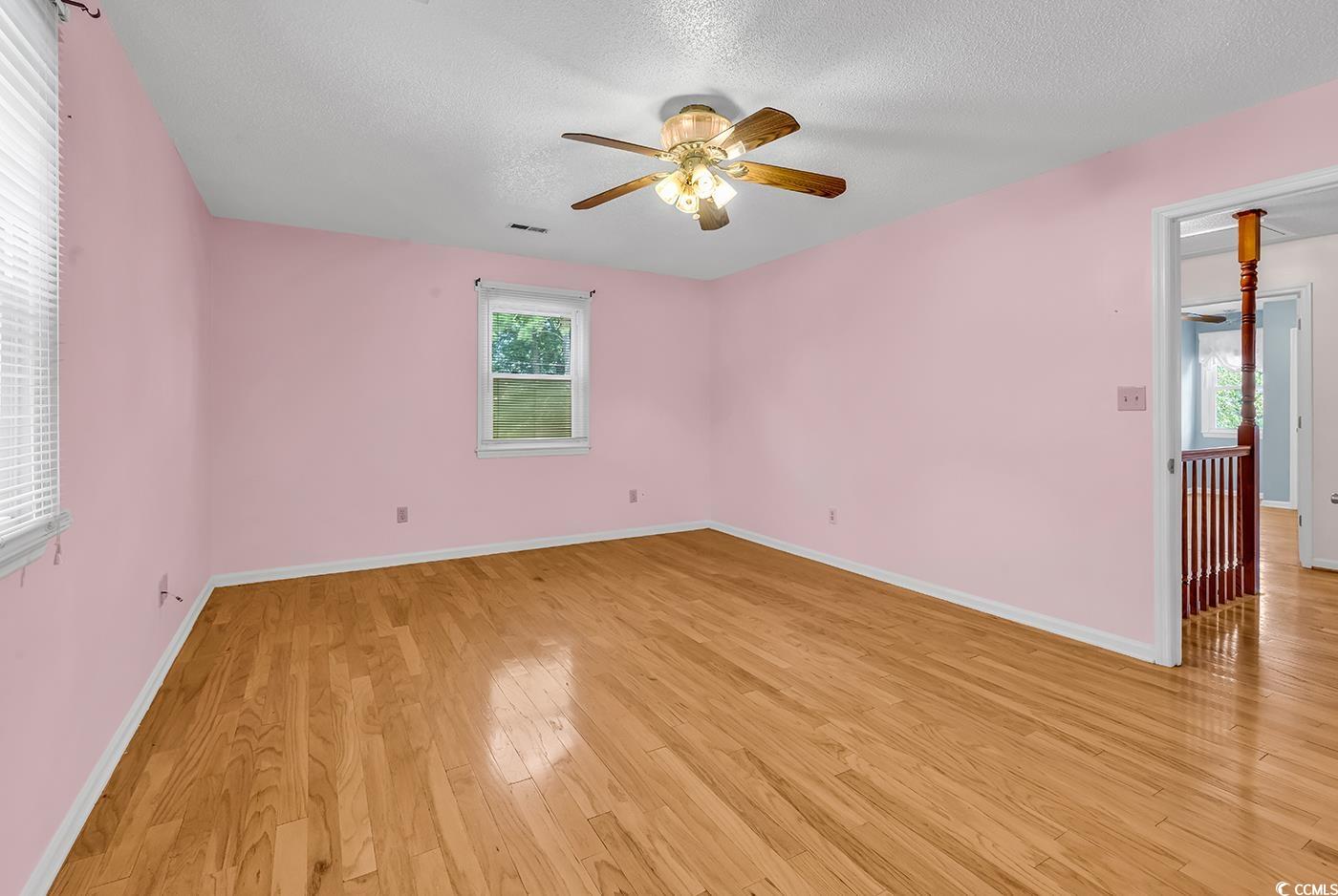 317 14th Avenue North Surfside Beach, SC 29575 - Photo 23 of 40 Unfurnished room with light wood-type flooring, ce
