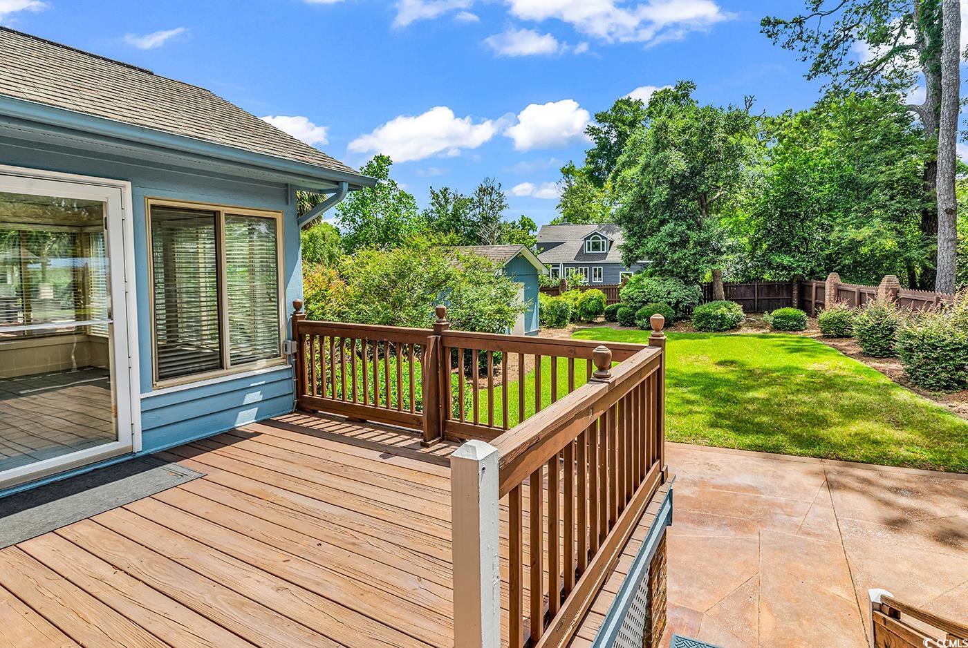 317 14th Avenue North Surfside Beach, SC 29575 - Photo 28 of 40 Wooden terrace featuring an outdoor structure