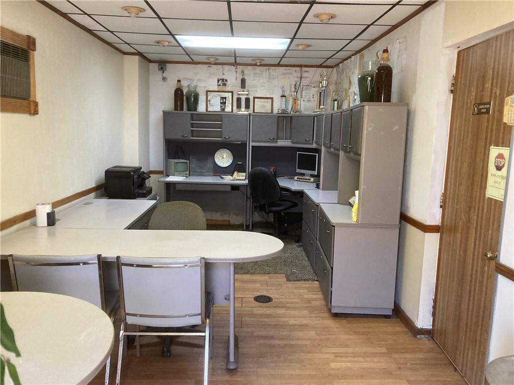 3200-3202 Willett Road Pittsburgh, PA 15227 - Photo 13 of 46 a kitchen with a table chairs and refrigerator