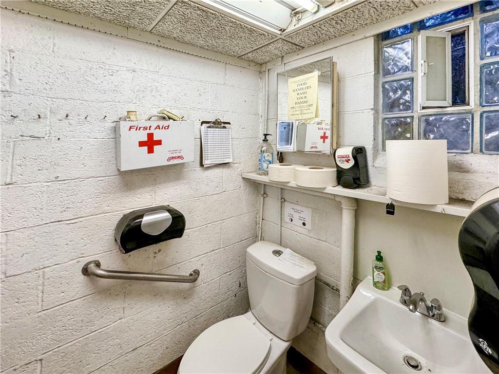 3200-3202 Willett Road Pittsburgh, PA 15227 - Photo 19 of 46 a bathroom with a sink toilet and mirror