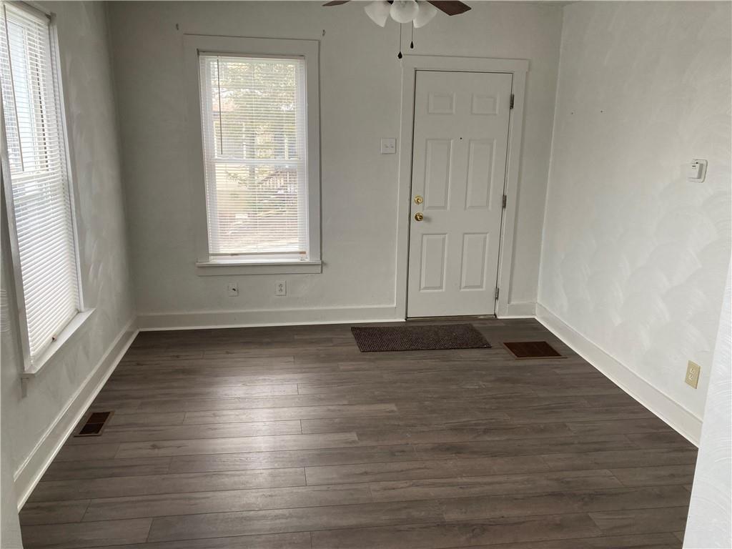 3200-3202 Willett Road Pittsburgh, PA 15227 - Photo 21 of 46 an empty room with wooden floor and windows