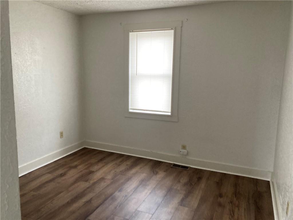 3200-3202 Willett Road Pittsburgh, PA 15227 - Photo 27 of 46 a view of a room with wooden floor and window