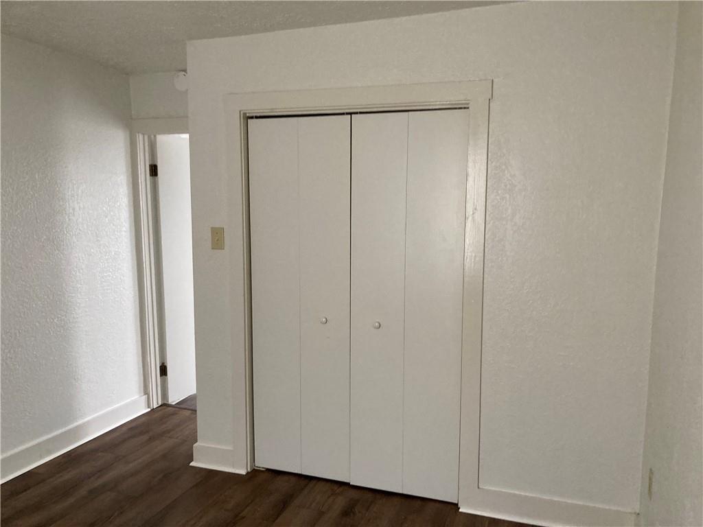 3200-3202 Willett Road Pittsburgh, PA 15227 - Photo 28 of 46 a view of an empty room with wooden floor