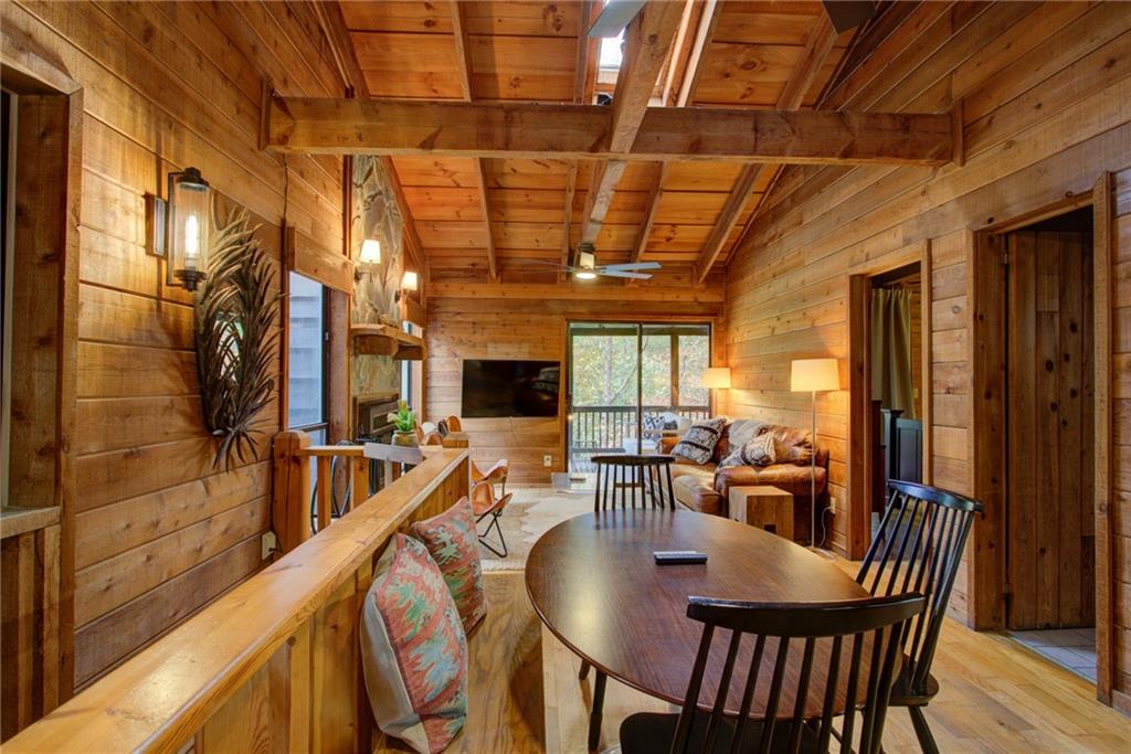290 East Overbend Trail Blue Ridge, GA 30513 - Photo 1 of 1 a view of a dining room with furniture window and outside view