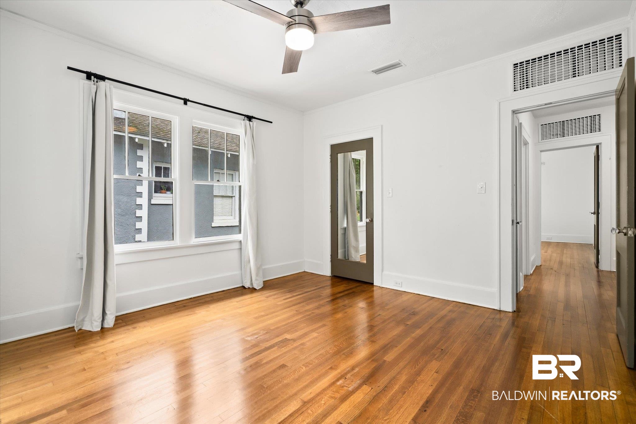 308 South Ann Street Mobile, AL 36604 - Photo 20 of 30 Spare room featuring ceiling fan and hardwood / wood-style flooring