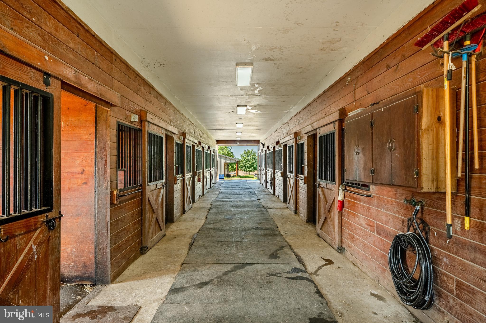 301 High Point Road Cochranville, PA 19330 - Photo 5 of 28 a view of a hallway with wooden walls and stairs