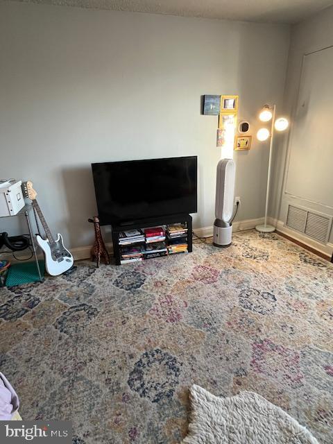 2001 Hamilton Street, Unit 1920 Philadelphia, PA 19130 - Photo 15 of 24 a view of a livingroom with workspace and a couch
