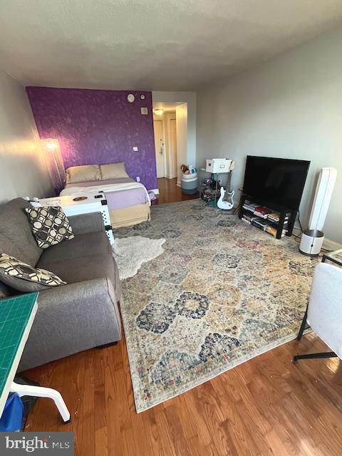 2001 Hamilton Street, Unit 1920 Philadelphia, PA 19130 - Photo 5 of 24 a living room with furniture and a flat screen tv