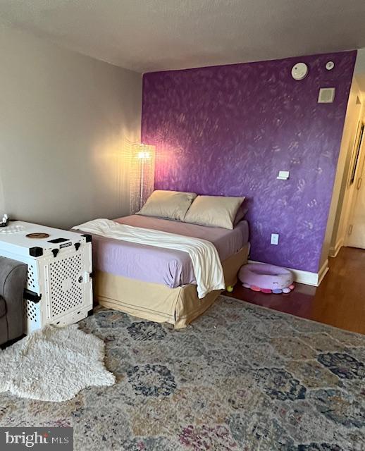 2001 Hamilton Street, Unit 1920 Philadelphia, PA 19130 - Photo 6 of 24 a bedroom with a bed and a potted plant