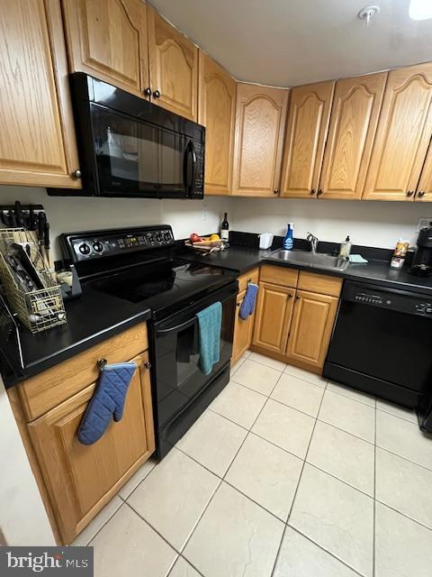 2001 Hamilton Street, Unit 1920 Philadelphia, PA 19130 - Photo 9 of 24 a kitchen with stainless steel appliances granite countertop a stove a sink and a microwave