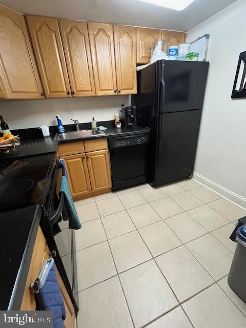 2001 Hamilton Street, Unit 1920 Philadelphia, PA 19130 - Photo 10 of 24 a kitchen with a refrigerator a stove a microwave and cabinets