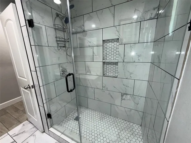 a front view of a house with swimming pool having outdoor seating