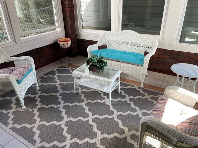 a living room with a couch and a table