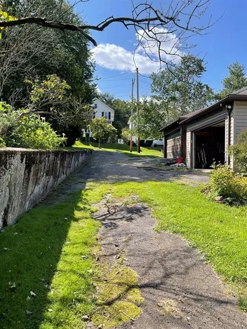 a view of a house with swimming pool