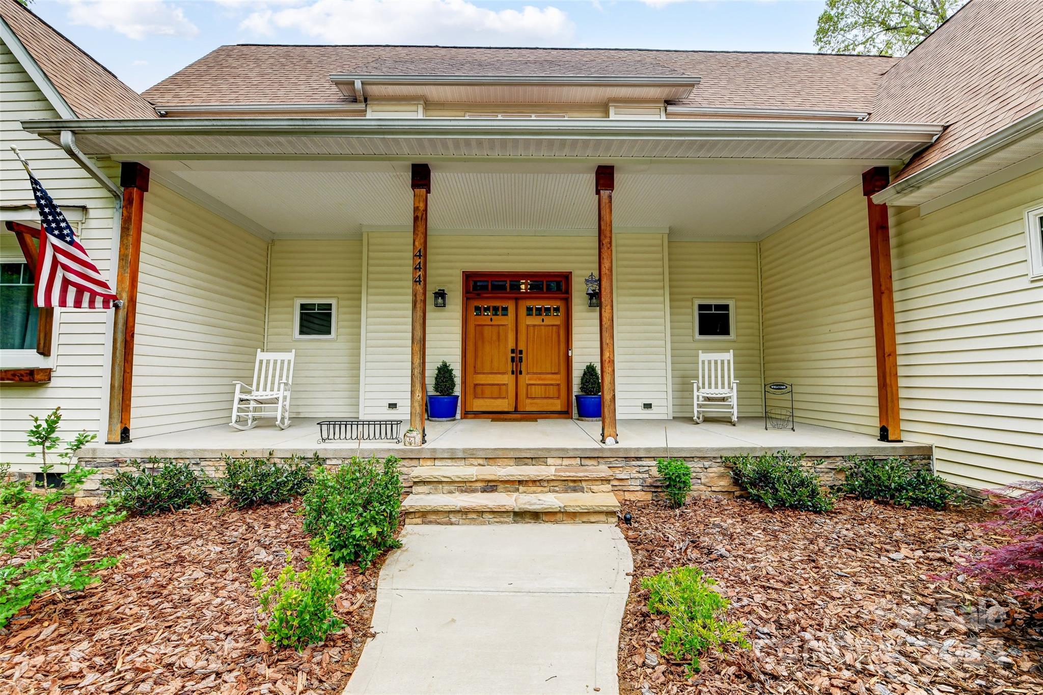 444 Evergreen Road Clover, SC 29710 - Photo 3 of 47 a front view of a house with garden