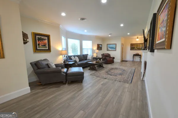 a living room with furniture or fireplace and a flat screen tv