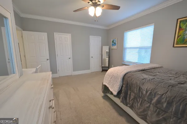 a utility room with sink dryer and washer