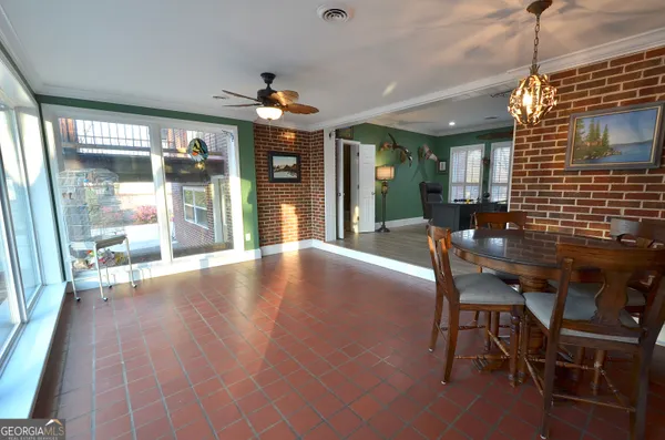 a backyard of apartments with large trees