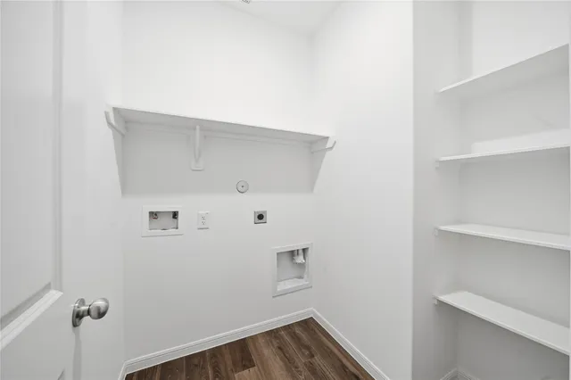 a view of a house with a yard and pathway