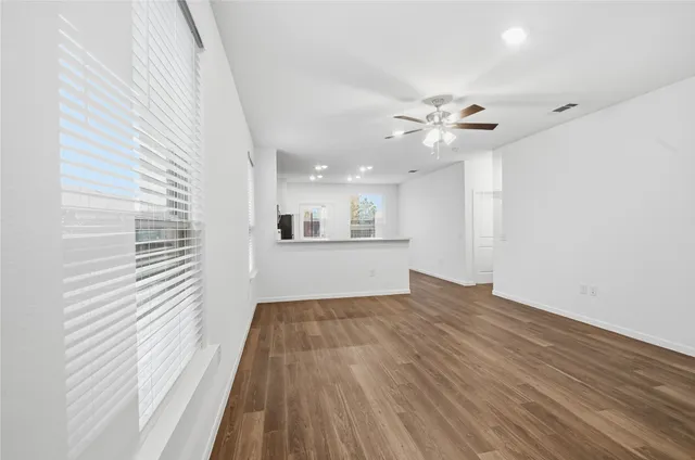 a kitchen with a sink cabinets and stainless steel appliances