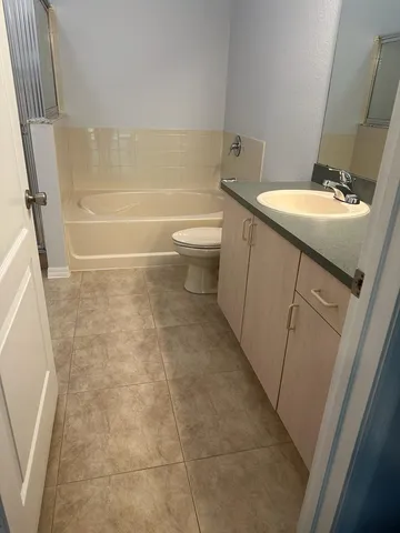 a view of outdoor space with wooden floor