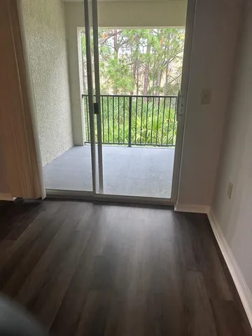 a view of a street from a balcony