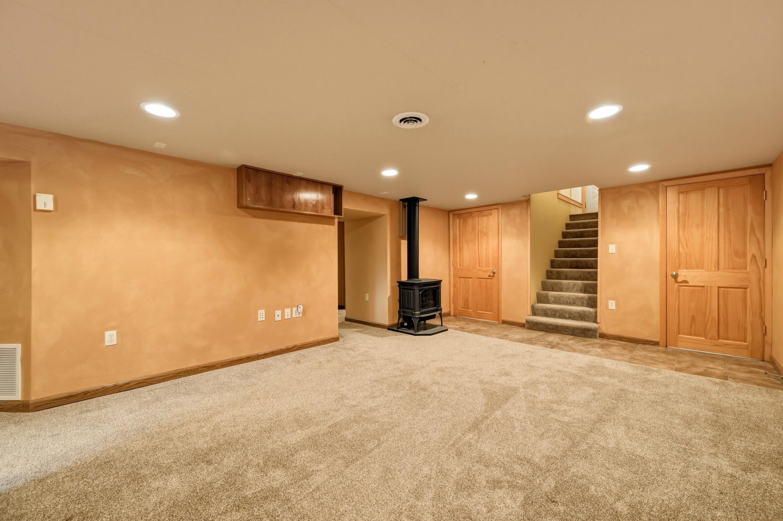 157 Upper Prairie Dog Road Banner, WY 82832 - Photo 50 of 71 151 Family room basement