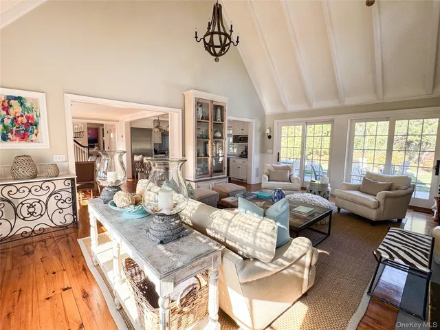 a living room with furniture and a table