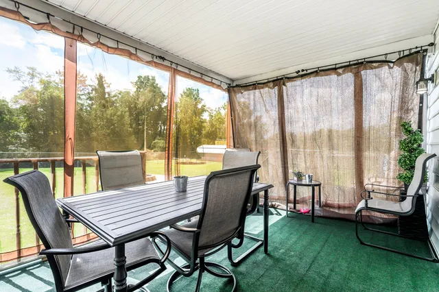 a view of a livingroom with furniture