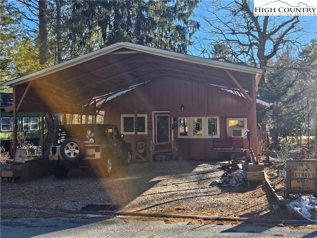 184 Trillium Road Newland, NC 28657 - Photo 2 of 15 a front view of a house with a yard