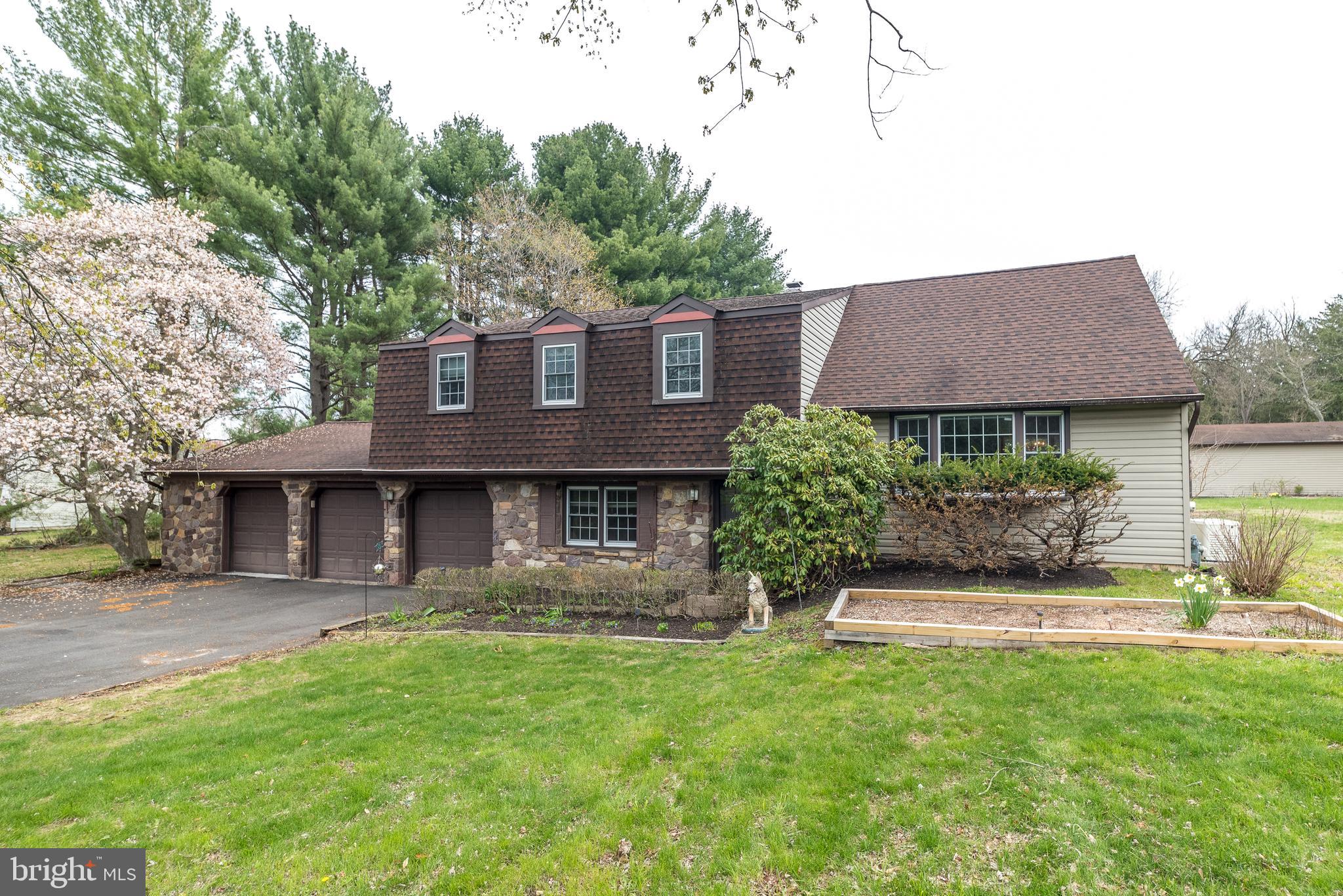 35 Fox Hill Road Doylestown, PA 18901 - Photo 1 of 49 a front view of a house with a yard