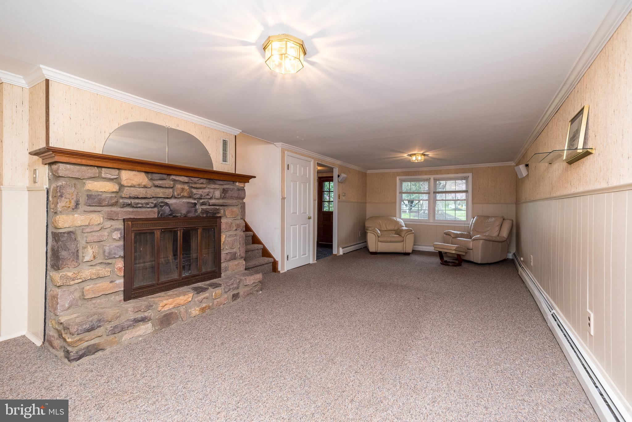 35 Fox Hill Road Doylestown, PA 18901 - Photo 16 of 49 a view of a livingroom with a fireplace