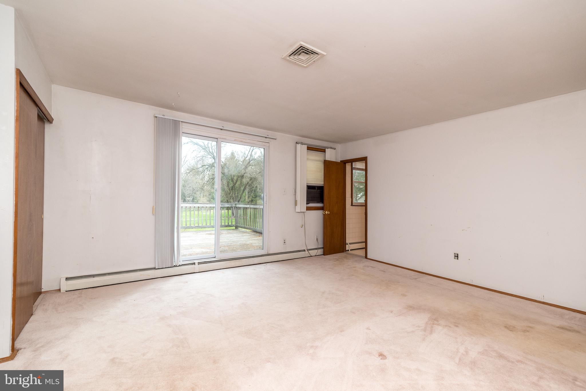 35 Fox Hill Road Doylestown, PA 18901 - Photo 23 of 49 a view of an empty room with a window