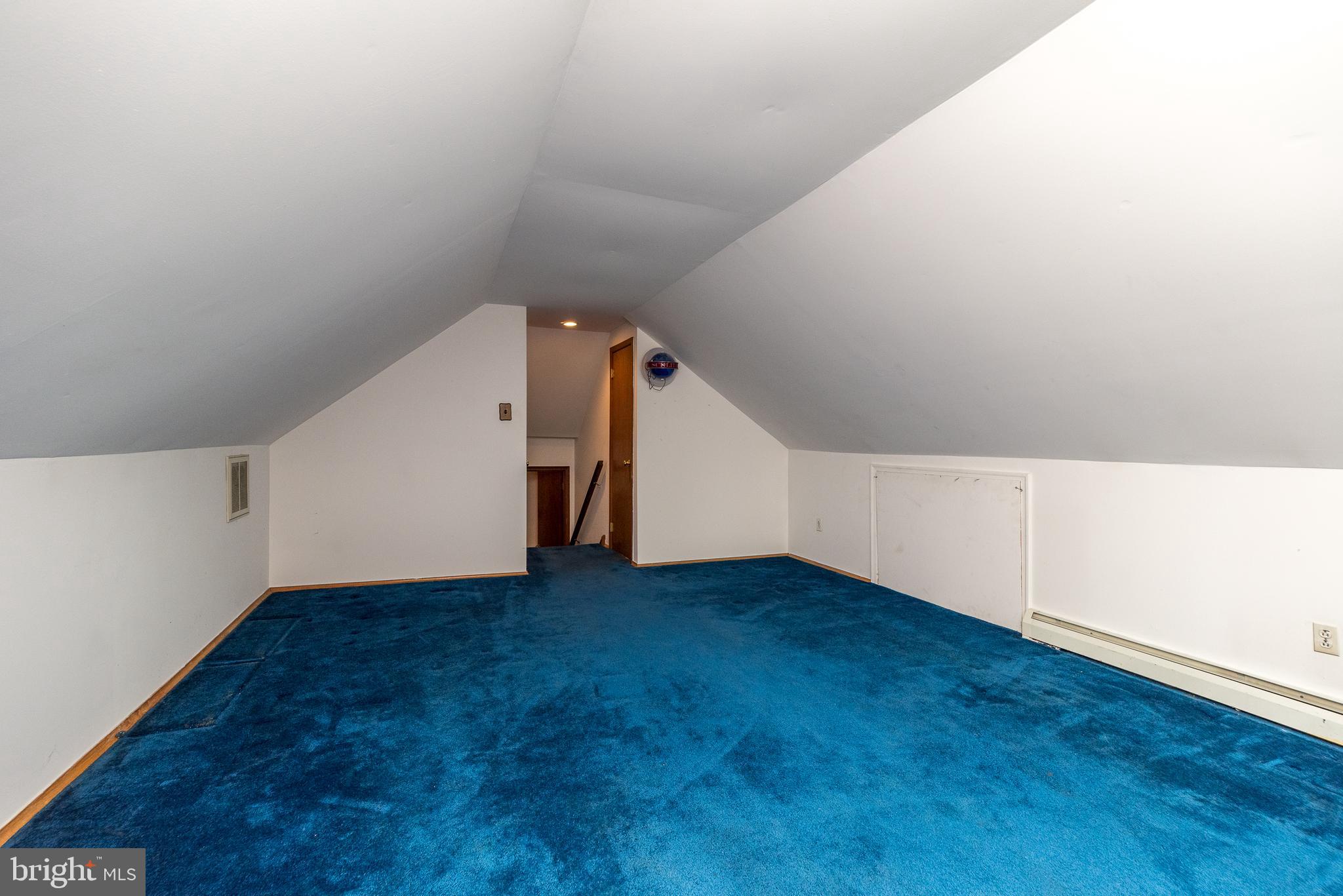 35 Fox Hill Road Doylestown, PA 18901 - Photo 33 of 49 a view of an empty room with wooden floor