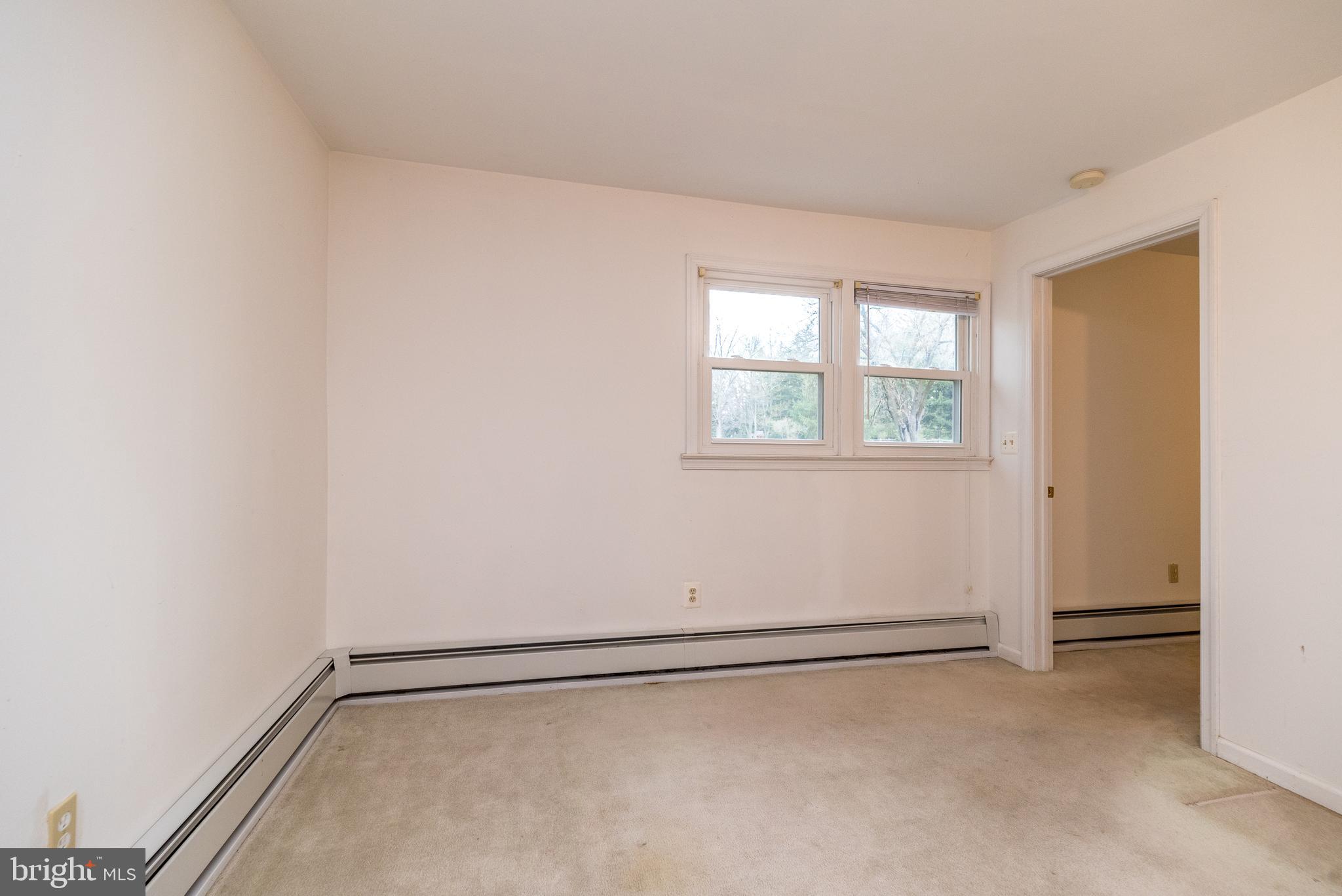 35 Fox Hill Road Doylestown, PA 18901 - Photo 39 of 49 a view of a room with rack on the wall and a window