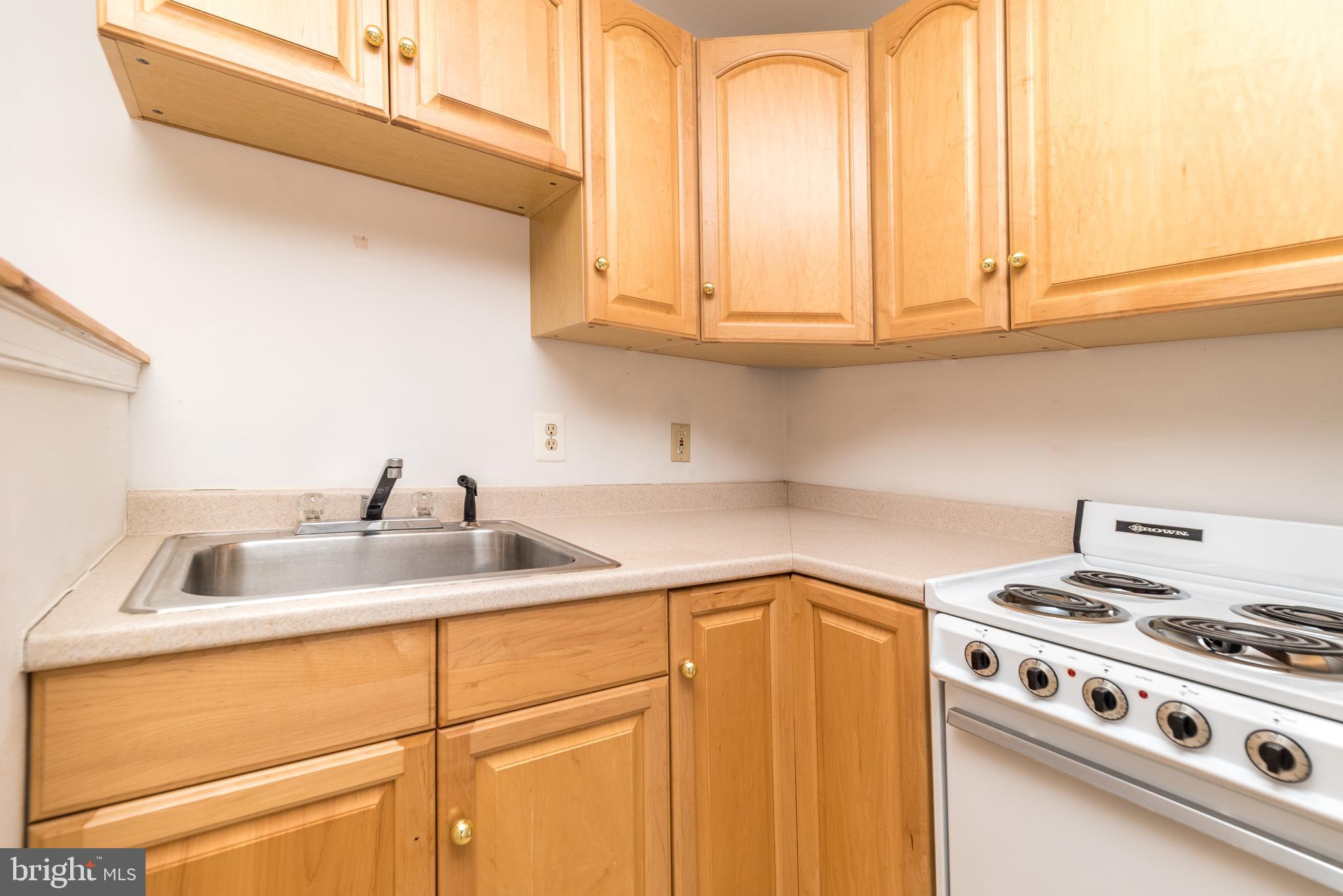 35 Fox Hill Road Doylestown, PA 18901 - Photo 41 of 49 a kitchen with stainless steel appliances granite countertop a sink and a white cabinets