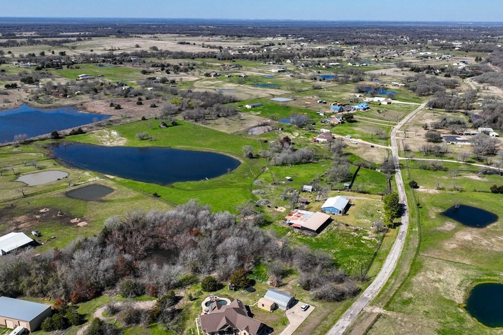 10276 Timber Trail Scurry, TX 75158 - Photo 36 of 40 an aerial view of residential houses with outdoor space