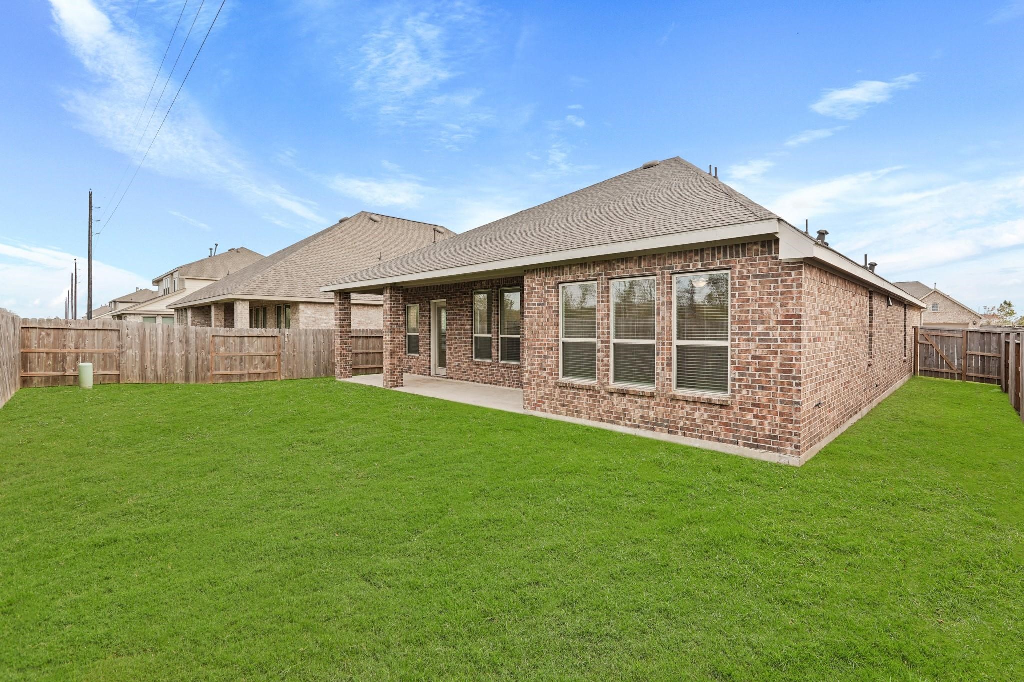 4915 Sierra Ridge Drive Rosenberg, TX 77469 - Photo 24 of 25 a view of a house with a backyard
