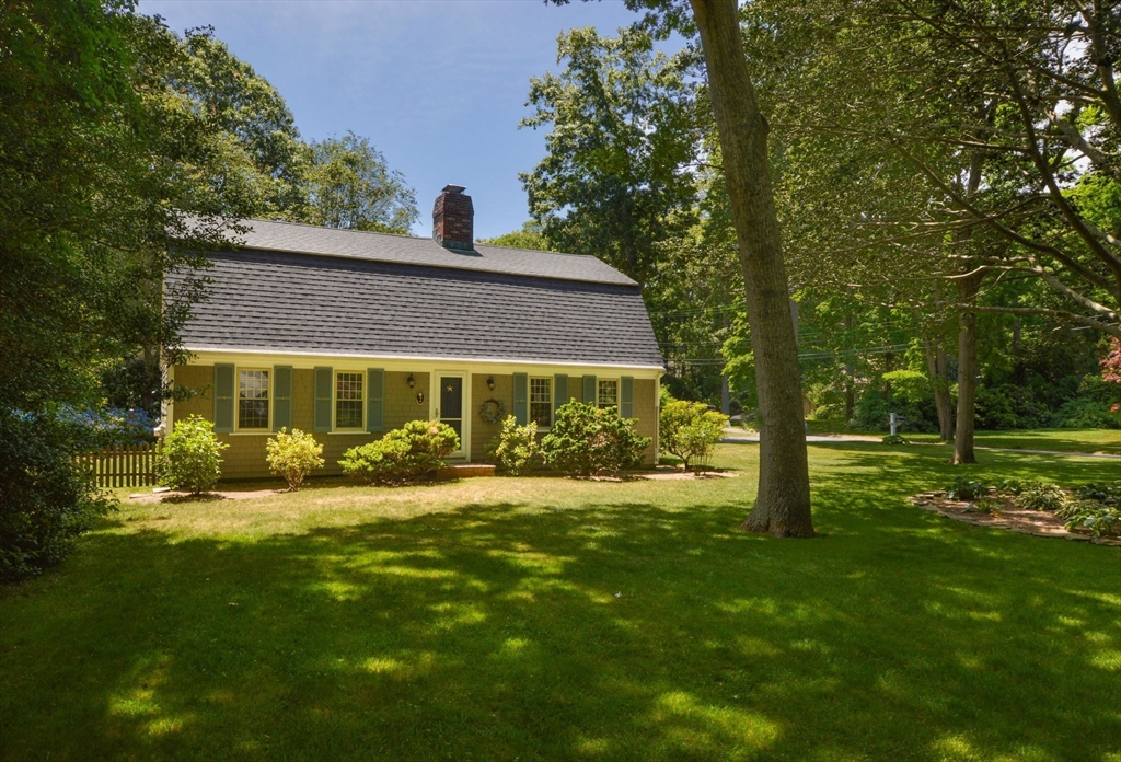 2 Jonathan Lane Sandwich, MA 02563 - Photo 1 of 38 a view of an house with backyard space and garden