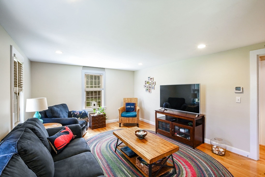 2 Jonathan Lane Sandwich, MA 02563 - Photo 17 of 38 a living room with furniture and a flat screen tv