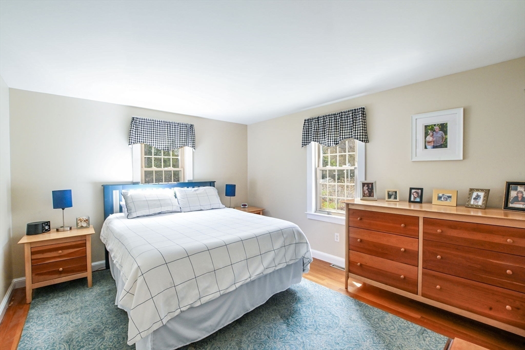 2 Jonathan Lane Sandwich, MA 02563 - Photo 19 of 38 a bedroom with a bed and a dresser