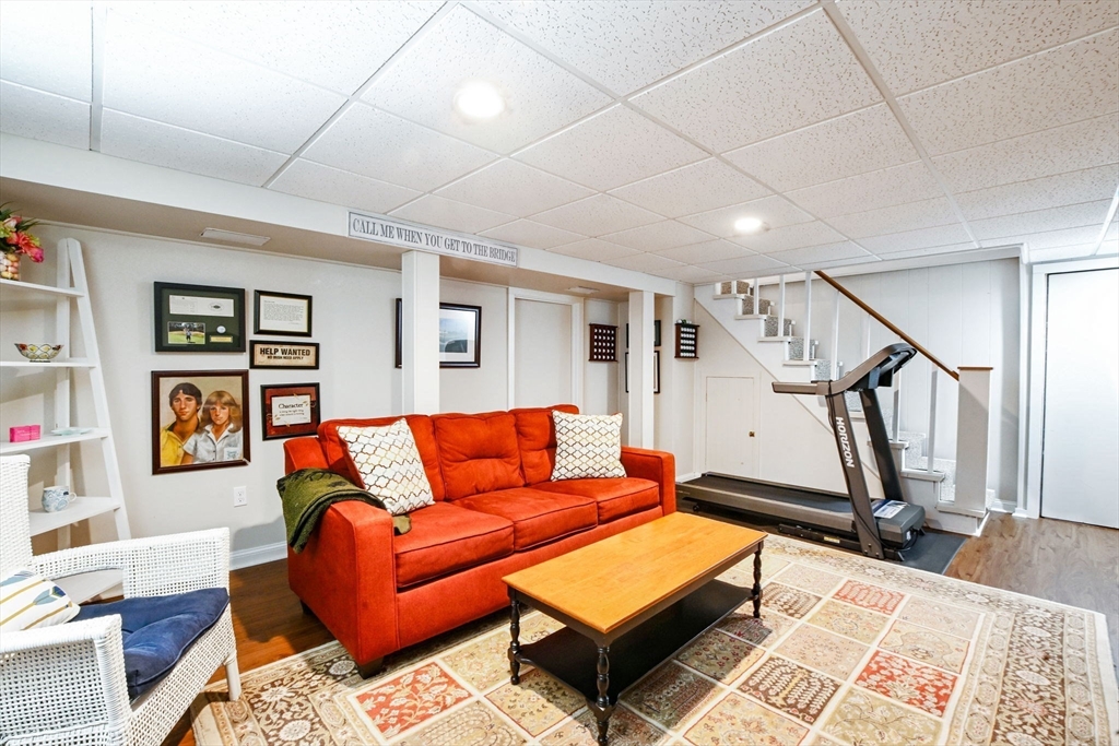 2 Jonathan Lane Sandwich, MA 02563 - Photo 24 of 38 a living room with furniture a rug and wooden floor