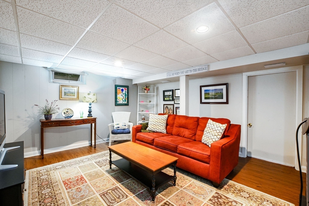 2 Jonathan Lane Sandwich, MA 02563 - Photo 25 of 38 a living room with furniture and a wooden floor